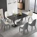 Orren Ellis 7 - Piece Stone Pedestal Dining Table Set Wood/Metal in Black | 29.53 H x 35.43 W x 63 D in | Wayfair B9662F938D0E4694AA48D8D8D45203ED