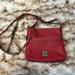 Dooney & Bourke Bags | Dooney And Bourke Red Pebbled Leather Letter Carrier Crossbody | Color: Red | Size: Os