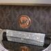 Michael Kors Bags | Michael Michael Kors Fulton Carryall Wallet Brown Signature | Color: Brown | Size: L 7.5 " X W 1.5 " Xh4"