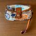 Dooney & Bourke Bags | Disney Dooney And Bourke Disney World Wallet Wristlet Nwt | Color: Brown/Cream | Size: Os