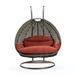 Bungalow Rose Samaira Wicker Hanging 2 person Egg Swing Chair Wicker/Rattan in Brown | Wayfair 5F6BD2A969EC4A22948D7DCDB5304562