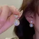 Boucles d'oreilles pendantes de tempérament de perle fine pour les femmes boucles d'oreilles