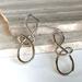 Anthropologie Jewelry | New~ Anthropologie Tied Up Twisted Silver Drop Earrings | Color: Silver | Size: Os