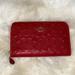 Coach Bags | Embossed Signature Leather Medium Zip Wallet | Color: Gold/Red | Size: Os