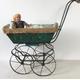 A Victorian dolls pram, tin body. French- this is very rare.