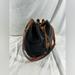 Dooney & Bourke Bags | Genuine Vintage Dooney & Bourke Black Tan Leather Drawstring Bucket Shoulder Bag | Color: Black/Tan | Size: Os