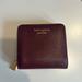 Kate Spade Accessories | Barely Used Kate Spade Small Bifold Wallet. | Color: Purple | Size: Os