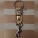 Coach Bags | Coach Gold/Silver Trigger Snap Bag Charm Keyring, Nwot | Color: Gold/Silver | Size: Os