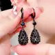 Boucles d'oreilles pendantes en forme de goutte de cristal noir pour femmes bijoux de fête