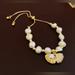 Anthropologie Jewelry | Baroque Summer Shell Freshwater Pearl Adjustable Bracelet. | Color: Gold/White | Size: Os