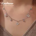 Lucktune Collier pendentif fleur de lotus zircon en acier inoxydable pour femme Collier chaîne tour