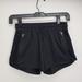 Athleta Bottoms | Athleta Girl Kids Size 12 Black Athletic Short Mesh Side Panels Zipper Pockets | Color: Black | Size: 12g