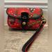 Dooney & Bourke Bags | Dooney And Bourke Disney Cruise Line Wristlet In Red- Like New | Color: Blue/Red | Size: H 3.75" X W 1.25" X L 6.25"