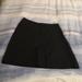 Coach Skirts | Like New Coach A Line Black Skirt Size 8 W/ Middle Pleat | Color: Black | Size: 8