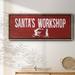 The Holiday Aisle® Santa's Workshop Framed On Canvas Textual Art Canvas, Solid Wood in Red/White | 12 H x 30 W x 1.5 D in | Wayfair