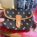 Dooney & Bourke Bags | Dooney & Bourke Brownish-Black/Tan Monogram Wristlet | Color: Brown/Tan | Size: Os