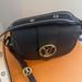 Louis Vuitton Bags | Louis Vuitton Leather Classy Bag. Used Five Times. In Very Good Condition. | Color: Black | Size: Os