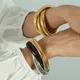 Bracelet en fil élastique pour femme fermeture côtelée or noir rose couleurs mélangées métal