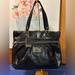 Coach Bags | Coach Poppy Large Shoulder Handbag (Euc) | Color: Black/Gold | Size: Os