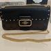 Coach Bags | Coach Black Leather/Brown With Black Monogram Clutch With Gold Chain | Color: Black/Brown | Size: 8”W X 4”H X 2” D