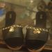 Michael Kors Shoes | Michael Kors Wedges 8 And 1/2 Black With The Mk Emblem And Lock It In Michael Ko | Color: Black/Gold | Size: 8.5