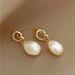 Anthropologie Jewelry | Anthropologie Gold Drop Knot Pearl Earrings | Color: Gold/White | Size: Os