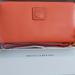 Dooney & Bourke Bags | Dooney And Bourke Florentine Leather Salmon Gen 2 Large Zip Wallet Wristlet | Color: Orange/Pink | Size: 8.5 X 5 1 Aprox