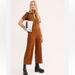 Free People Pants & Jumpsuits | Free People Ellie Leopard Print Ellie Print Jumpsuit Size Large Bin 237 | Color: Black/Brown | Size: L