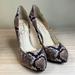 Jessica Simpson Shoes | Jessica Simpson Snakeskin Heels | Color: Black/Tan | Size: 7.5