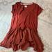 Anthropologie Tops | Burnt Orange Anthropologie Peplum Tee | Color: Orange/Red | Size: S