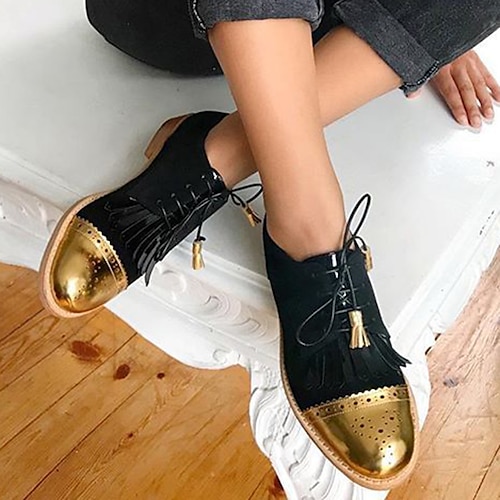 Schwarze und goldene Oxford-Schuhe für Damen – Brogues mit Schnürung, Flügelkappe, Fransen und Quaste für den lässigen Vintage-Stil Image
