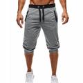 Herren Jogginghose Trainingshose Abgeschnittene Hose Freizeithose Caprihose Patchwork Kordelzug Glatt Täglich Festtage Ausgehen Strassenmode Basic Schwarz Hellgrau Mikro-elastisch