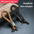 AliExpress Collection 2Pcs Leather Rope KeyChain Hand Woven Horseshoe Buckle Key Ring Car Key Rings