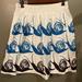 Anthropologie Skirts | Anthropologie Maeve White Skirt W/ Blue Black Snail Design Pockets Size Medium | Color: Blue/White | Size: M