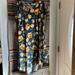 Lularoe Dresses | Lularoe Carly Dress Dark Blue With Yellow Floral Pattern L | Color: Blue/Gold | Size: L