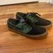 Nike Shoes | Nike Sb Zoom Air Stefan Janoski Nike Skateboarding Sneakers Size 9.5 | Color: Black/Green | Size: 9.5