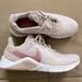 Nike Shoes | Nike Women’s 8.5 Pink Pre Owned Sneakers | Color: Cream/Pink | Size: 8.5