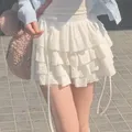 Mini jupe en dentelle Kawaii pour femmes et filles Lolita mignonne ligne A blanche jupe plissée