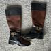 Michael Kors Shoes | Michael Kors Two Toned Black And Brown Riding Boot. Size 7.5 | Color: Black/Brown | Size: 7.5