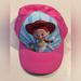 Disney Accessories | Disney Pixar Toy Story 4 Girls Jessie Adjustable Hat Cap | Color: Pink/White | Size: Osg