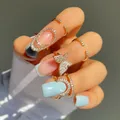 Bague de couverture d'ongle en cristal pour femmes faux ongles bijoux de fête doigt doigt