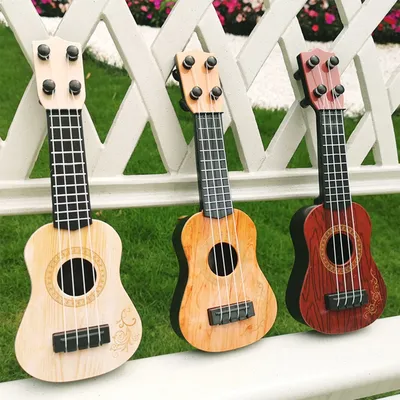 1-5 Stück Kinder Ukulele Gitarre Musikspiel zeug 4 Saiten Mini Modell E-Gitarre Miniatur Musik Image