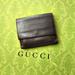 Gucci Bags | Gucci Dark Brown Leather Embossed Logo Wallet | Color: Brown | Size: 12cm10cm2cm