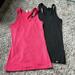 Under Armour Tops | 2 Under Armour Women’s Heat Gear Ribbed Tanks. Guc. | Color: Black/Pink | Size: M