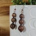 Anthropologie Jewelry | Exotic Stacked Wood Bead Drop Earrings | Color: Black/Brown | Size: Os