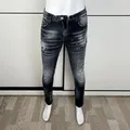 Jeans da uomo di moda di strada retrò nero grigio elastico Slim Jeans strappati da uomo pantaloni di