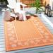 Brown/Orange 63 x 0.25 in Area Rug - Bay Isle Home™ Lueck Floral Rust/Tan Indoor/Outdoor Area Rug | 63 W x 0.25 D in | Wayfair BAYI7010 37241974