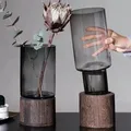 Vases européens pour plantes hydroponiques base en bois de fleurs insérées vase en verre