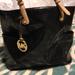 Michael Kors Bags | Michael Kors Patent Leather Circle Monogram Purse | Color: Black/Tan | Size: Os