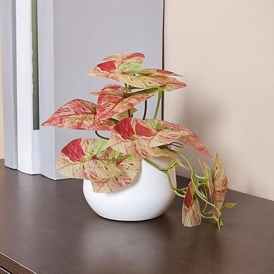Améliorez la décoration de votre maison avec des arrangements réalistes de plantes artificielles en pot, ajoutant de la verdure et une beauté naturelle à n'importe quelle pièce.